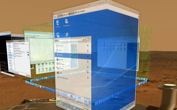 Alcuni effetti Beryl in azione: In questo screenshot si notano gli effetti di trasparenza dei 4 desktop, sollevamento finestre in base allo stack di ordinamento, una shell a meta' tra 2 facce e in primo piano (finestra a sfondo blu) una macchina virtuale su VMware che sta eseguendo SuSE 10.2. Notare che anch'essa subisce tutti gli effetti XGL tra cui anche trasparenze in tempo reale.